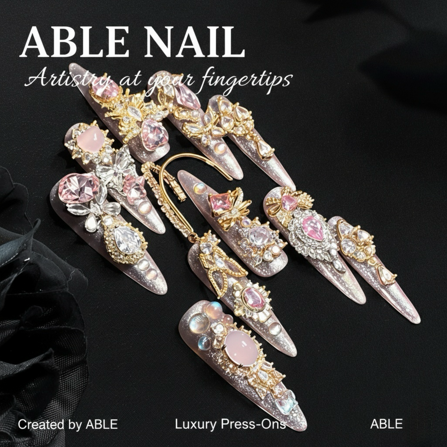 Decorative press-on nails with gemstones on a black background, featuring the brand 'ABLE'.