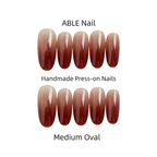 ABLE Nail handmade press-on nails with medium oval shape on a white background