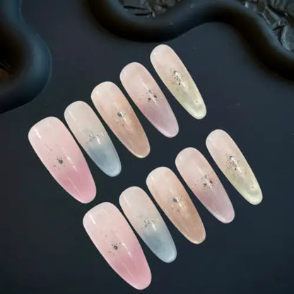 Set of gradient nail art designs on a dark background