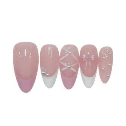 Set of pink and white gradient nail designs on a white background