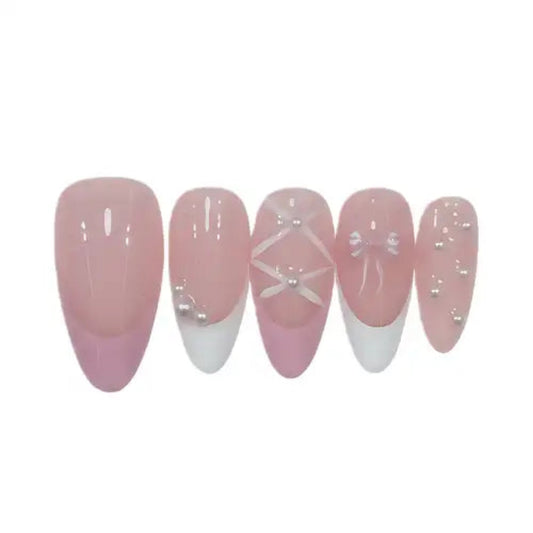 Set of pink and white gradient nail designs on a white background