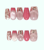 Set of pink and glittery nail designs on a white background