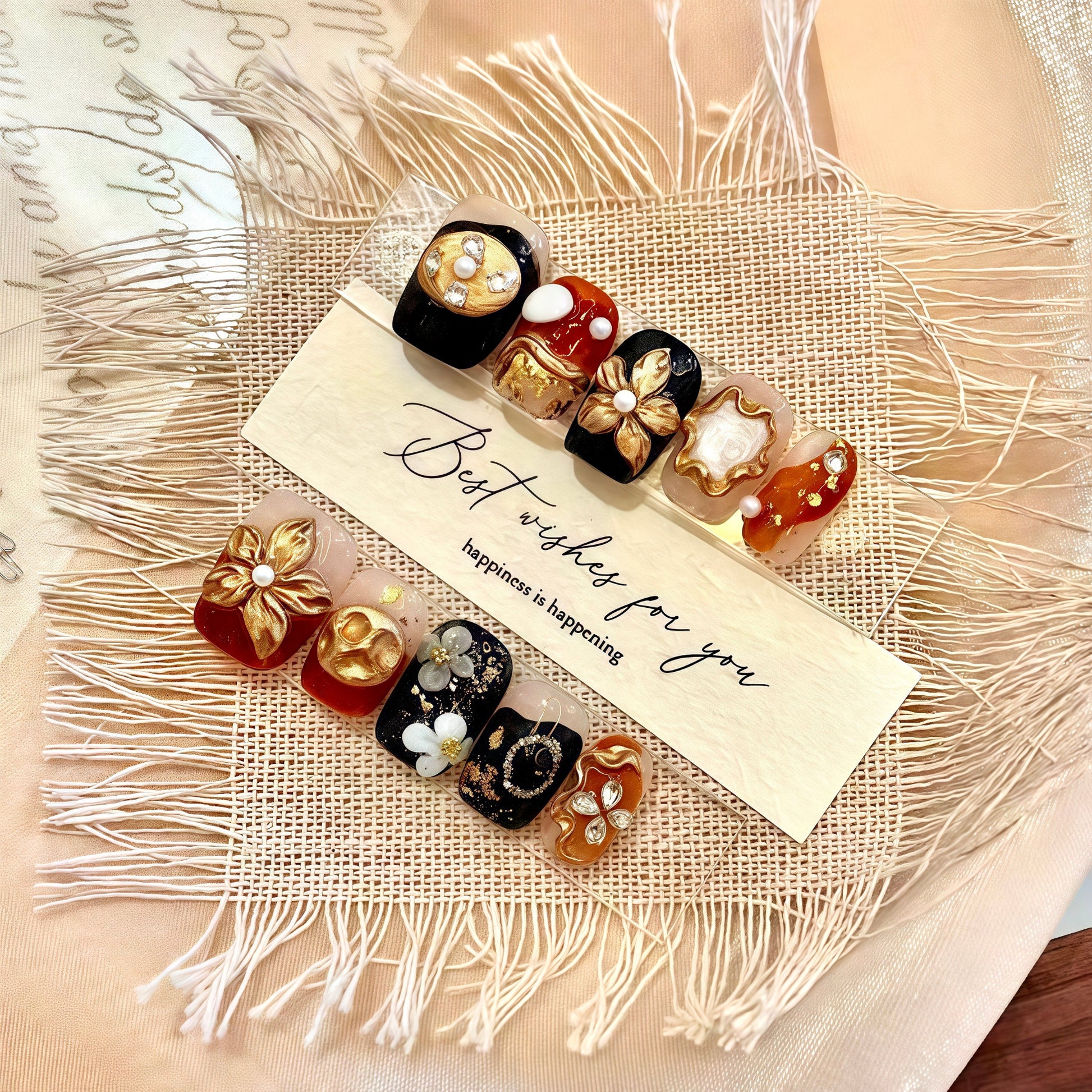 Decorative hair clips with pearls and flowers on a textured fabric background