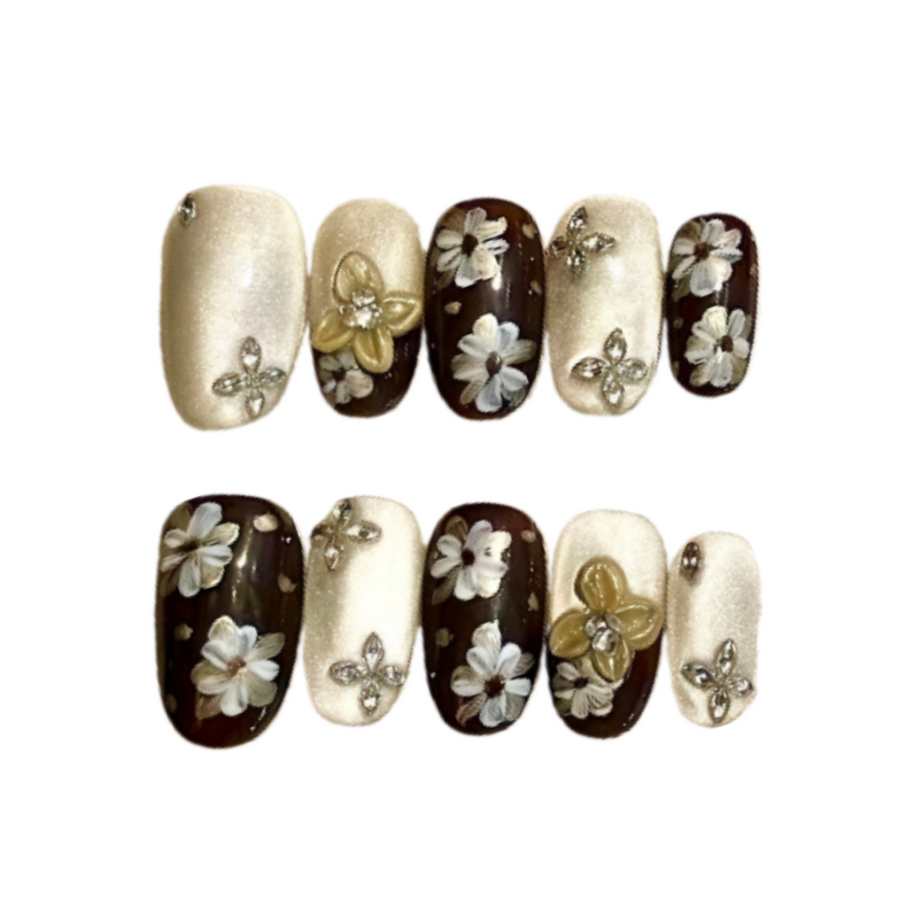 Set of nail art stickers with floral and butterfly designs on a white background