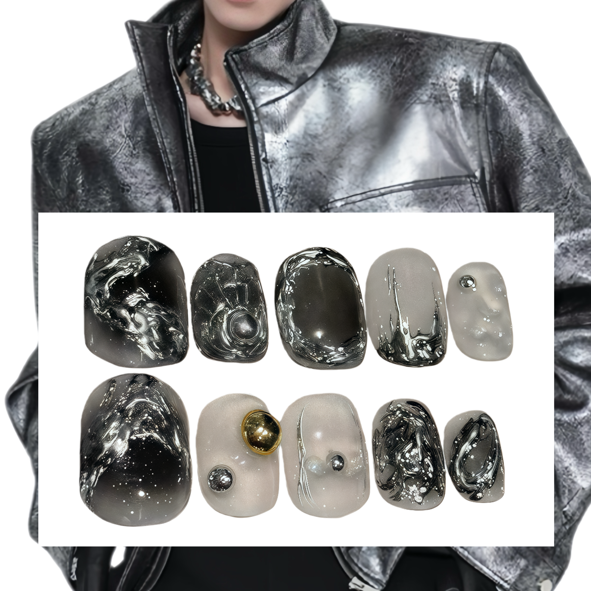 Nail art display with black, gray, and gold designs on a white background, worn by a person in a metallic jacket.