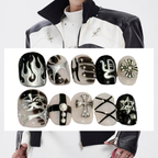 Collection of black and white nail art designs with decorative elements on a white background.