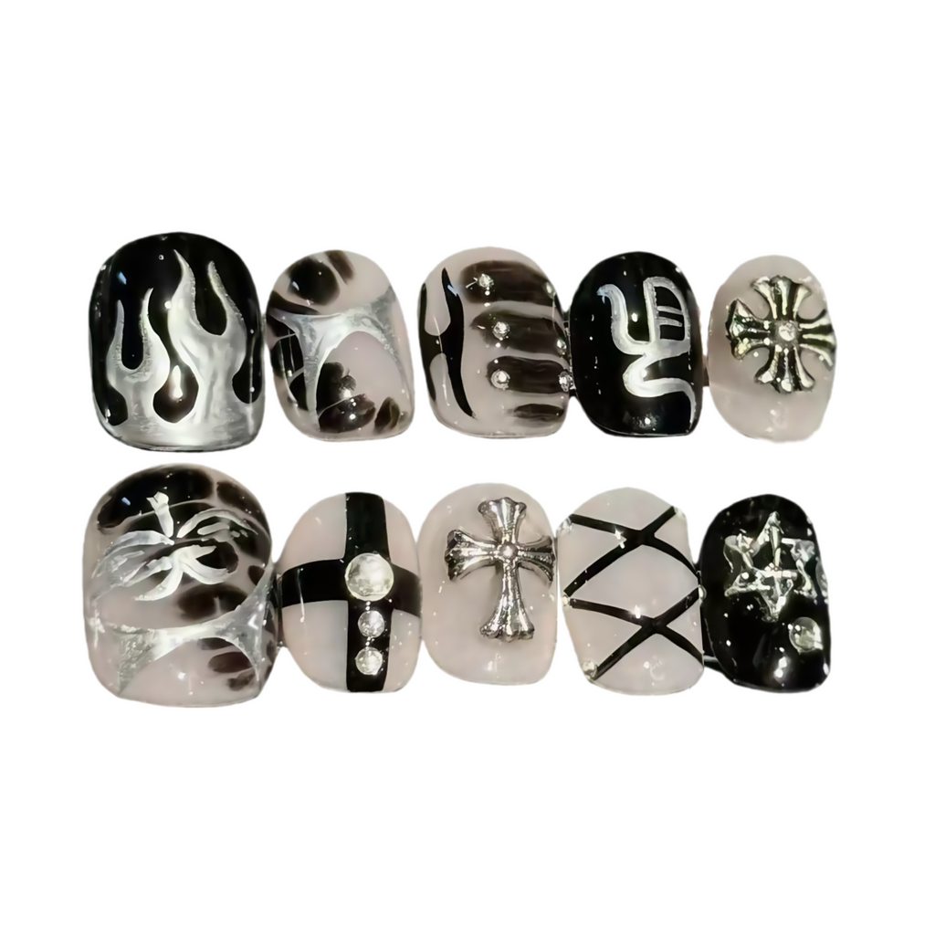 Black and white nail art designs on a white background