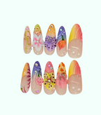 Set of colorful nail art designs on a white background