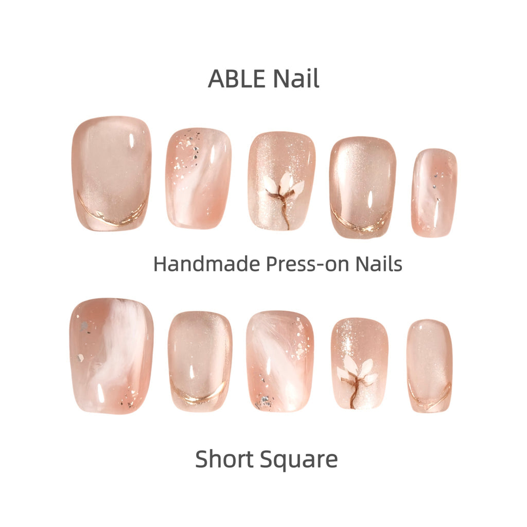 Collection of short square handmade press-on nails by ABLE Nail on a white background.