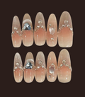 Set of decorative nails with gemstones on a dark background