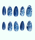 Set of blue and white patterned nail art designs on a white background