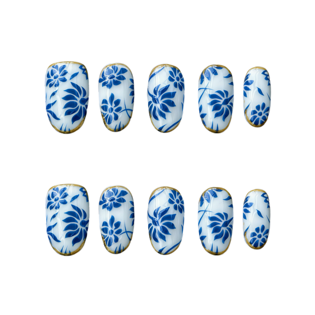 Set of blue floral nail art designs on white background