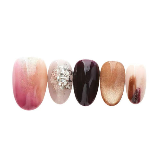 Five nail polish colors arranged in a row on a white background