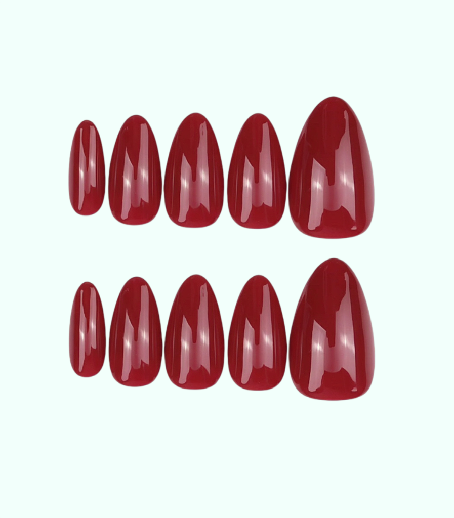 Set of red nail polish on a white background