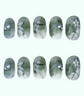 Set of nail art stickers with floral design on a white background