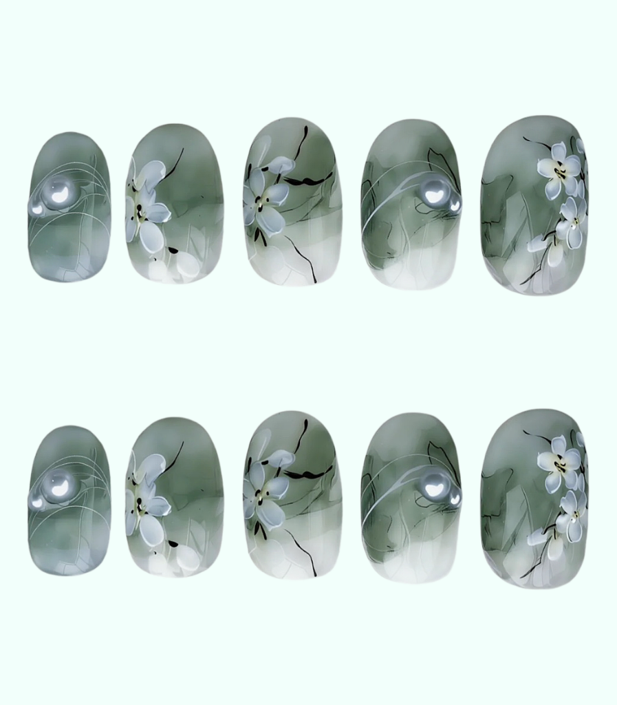 Set of nail art stickers with floral design on a white background