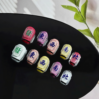 Colorful rectangular objects with Chinese characters on a black surface