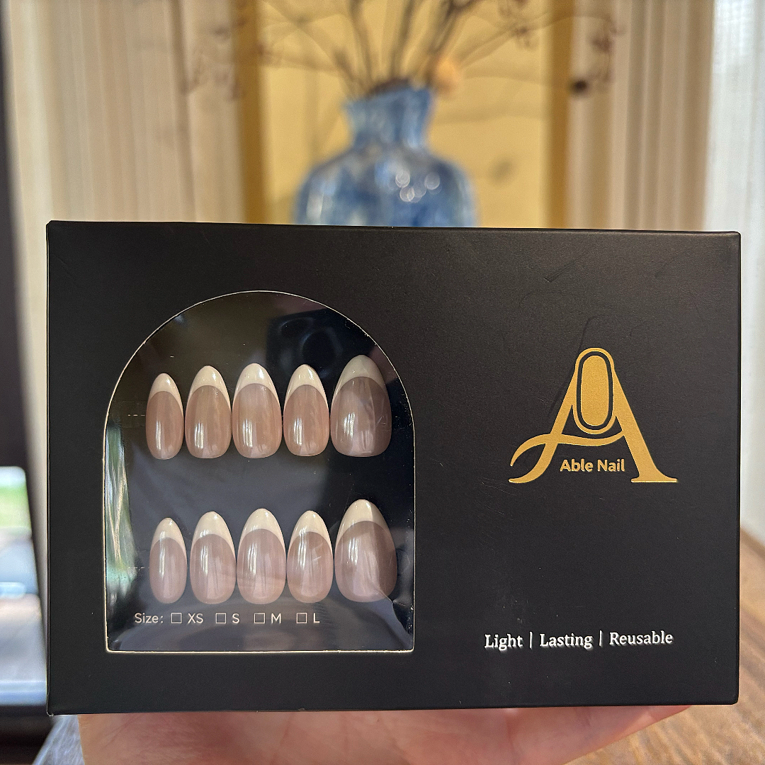 Box of Able Nail products with a clear window showing nail samples.