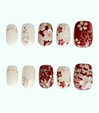 Set of nail art designs with floral patterns on a white background