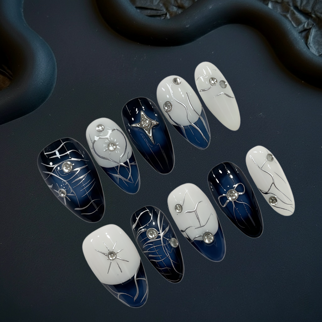 Set of nail art designs on a dark surface