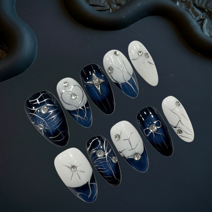 Set of nail art designs on a dark surface