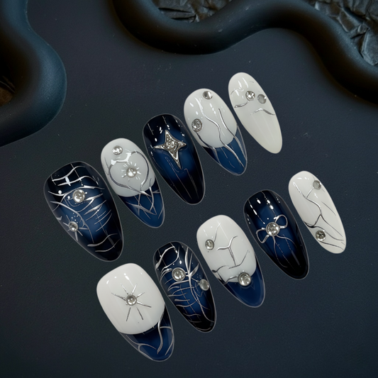 Set of nail art designs on a dark surface