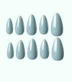 Set of light blue nail polish on a white background