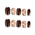 Set of nail art designs with floral patterns on a white background