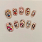 Nail art with cartoon character designs on a light background