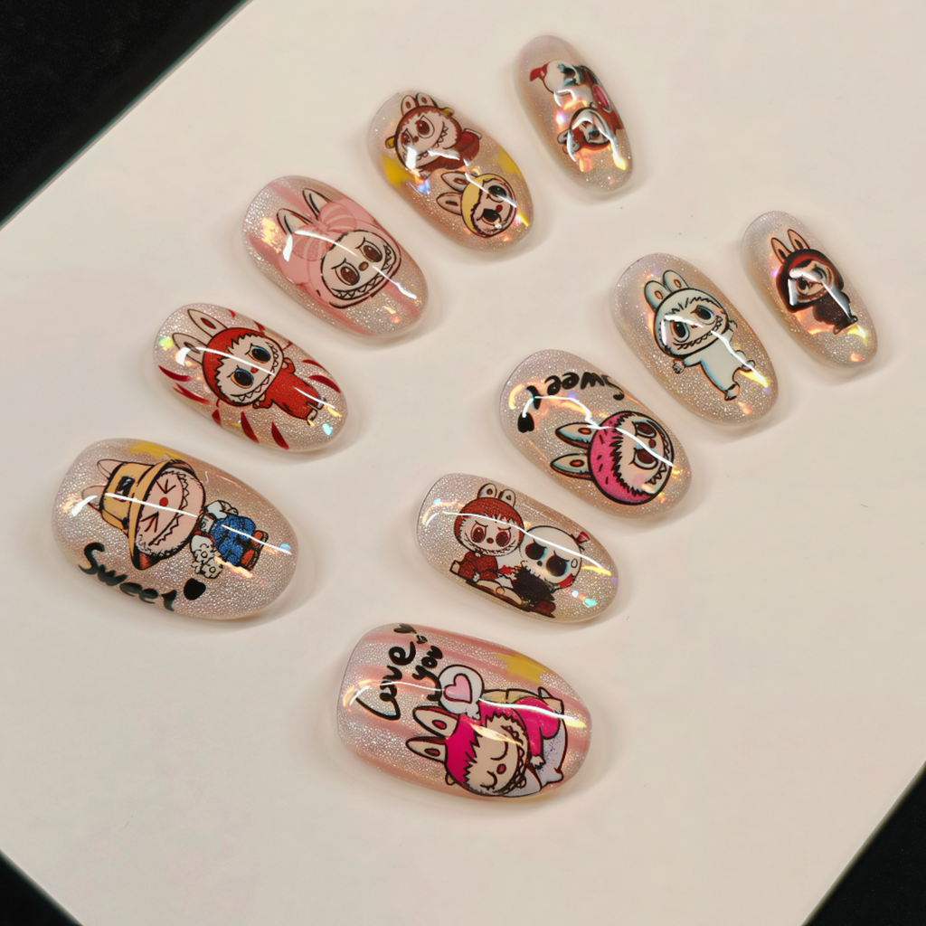 Nail art designs with cartoon characters on a white background