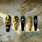 Set of decorative hair clips with gold and black accents on a dragon-themed background