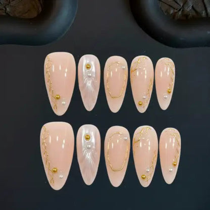 Set of pink nail art designs with gold accents on a dark background