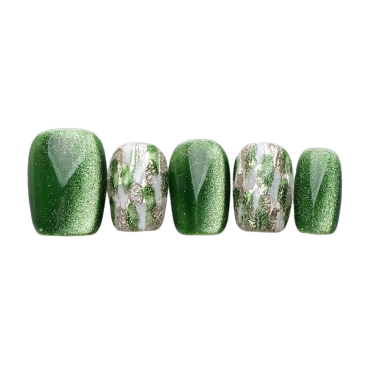 Five green and silver glitter nail art designs on a white background