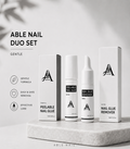 Able Nail Duo Set with nail glue and remover on a light gray background