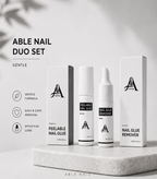 Able Nail Duo Set with nail glue and remover on a light gray background