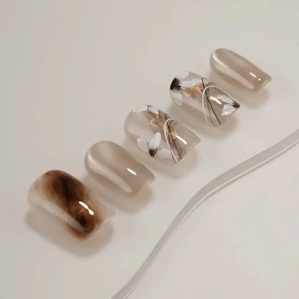 Set of nail art designs on a white background