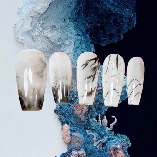 Set of five decorative nails with a marble design on a textured blue and white background