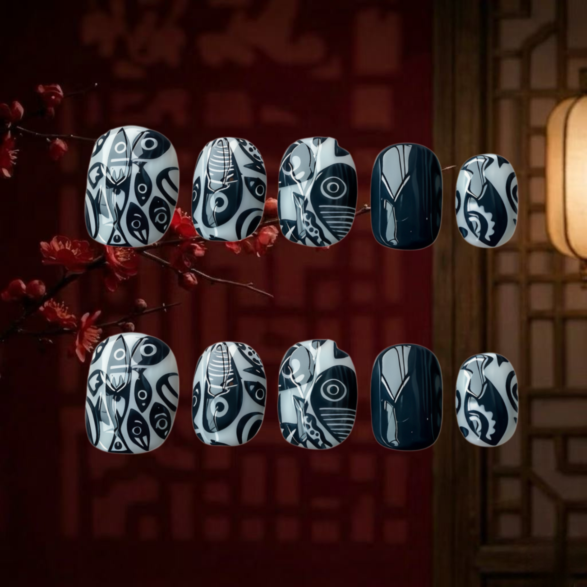 Decorative nail art with black and white patterns on a dark background