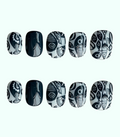Black and white patterned nail art designs on a white background