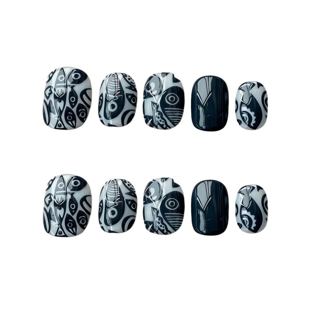 Set of black and white nail art designs on a white background