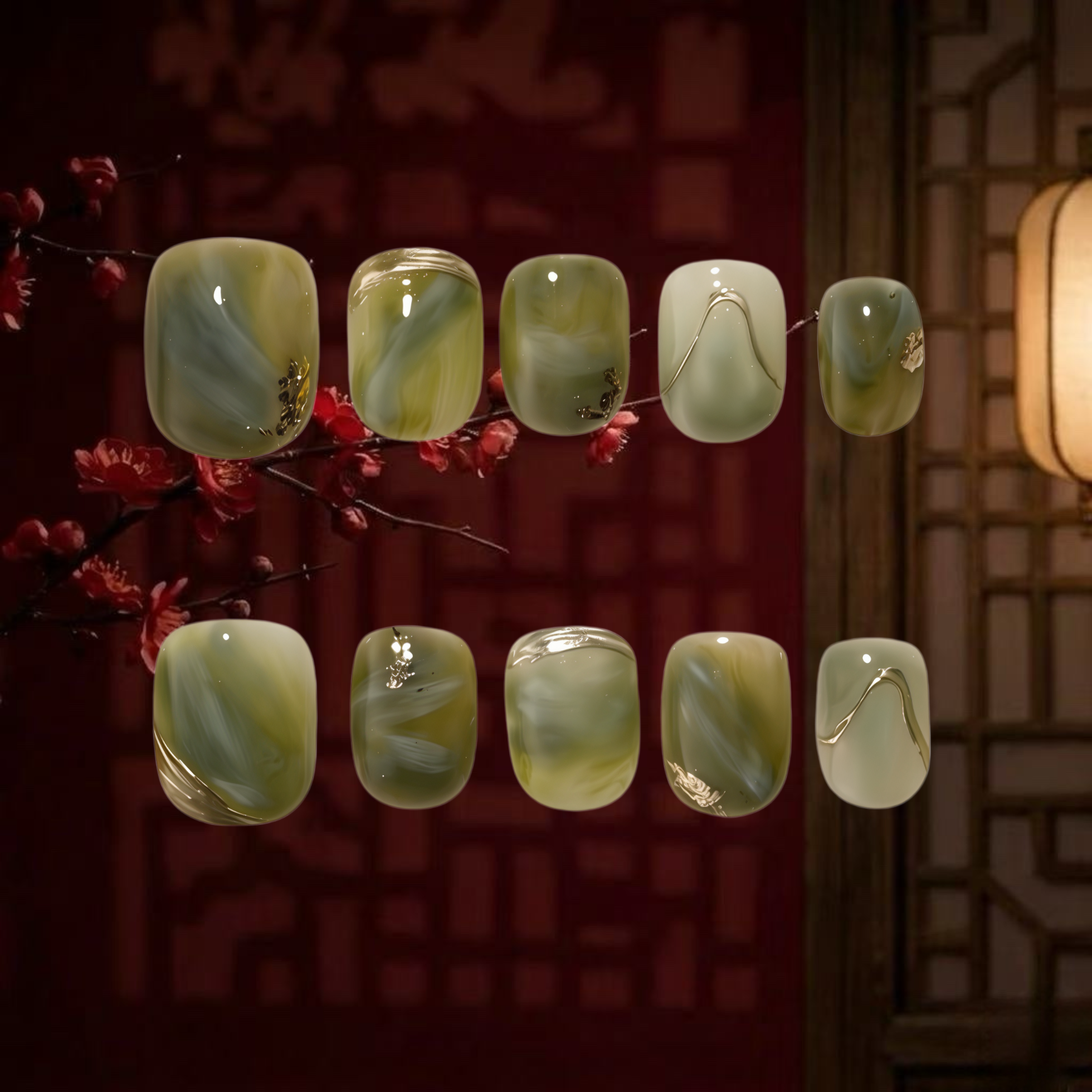 Set of green and white nail art designs on a dark background with cherry blossoms.