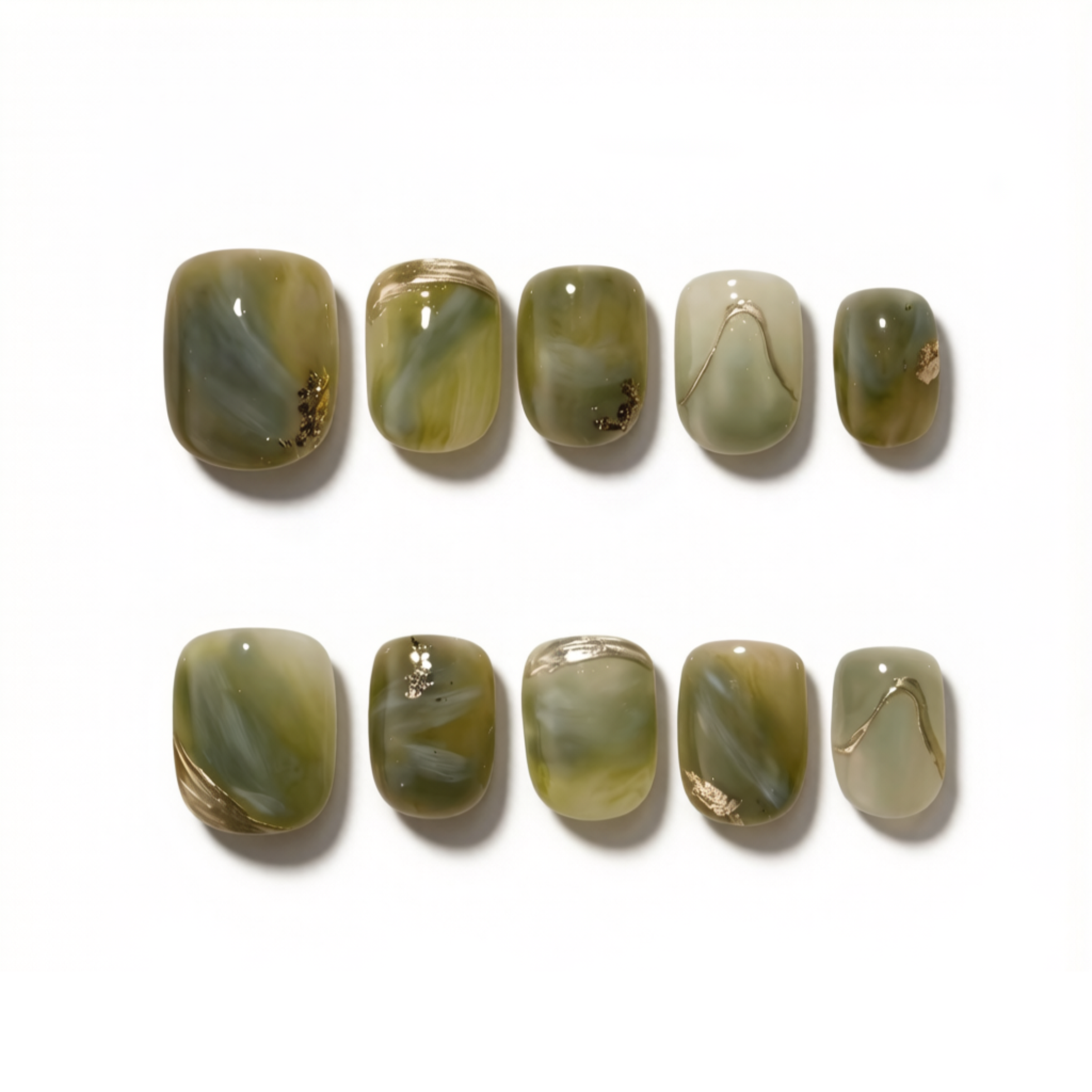 Set of green marbled nail art designs on a white background