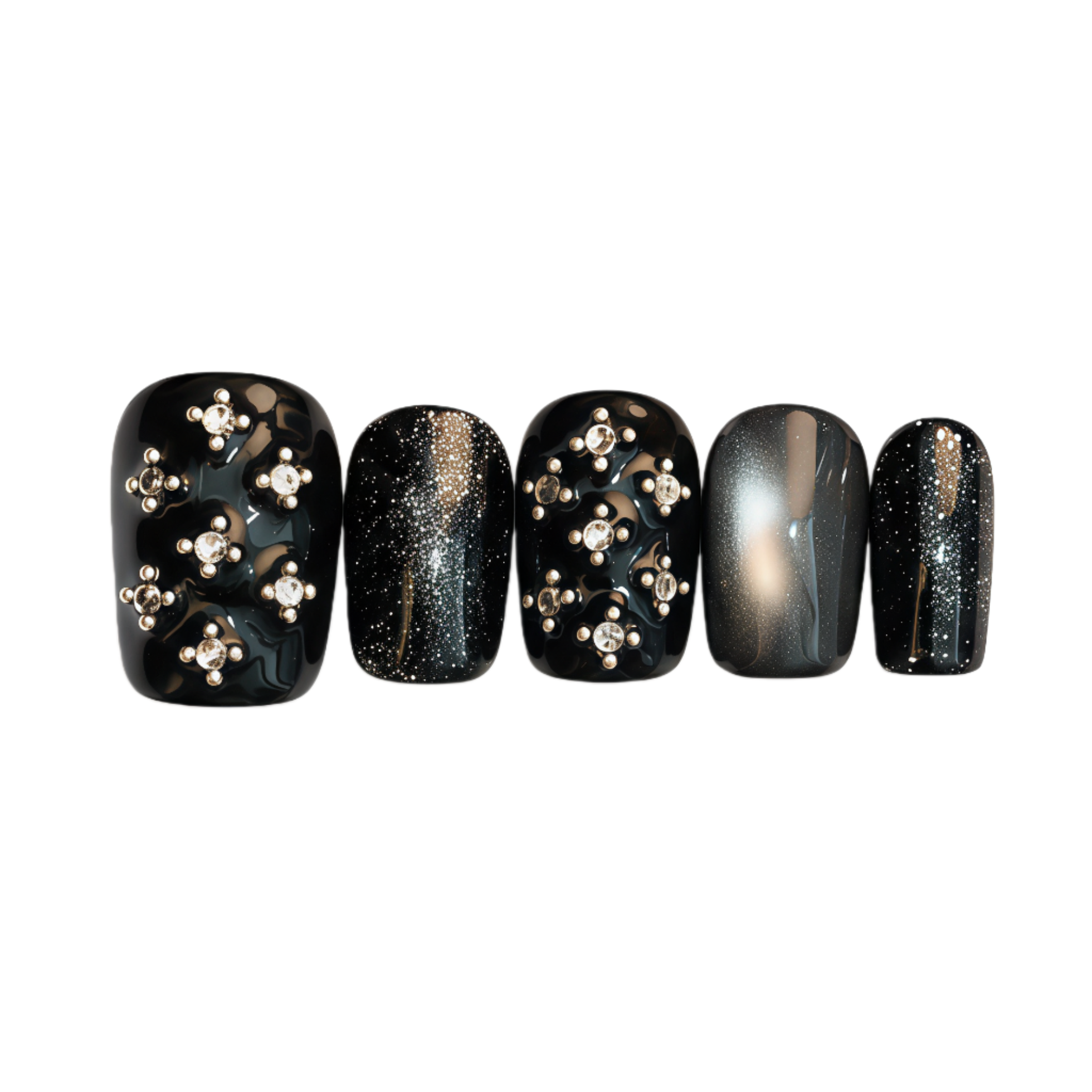 Set of five black nail art designs with gold and silver decorations on a white background