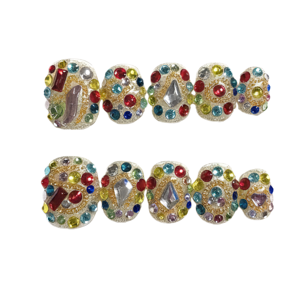 Colorful rhinestone jewelry set on a white background