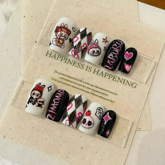 Decorative nail art set on a piece of paper with text