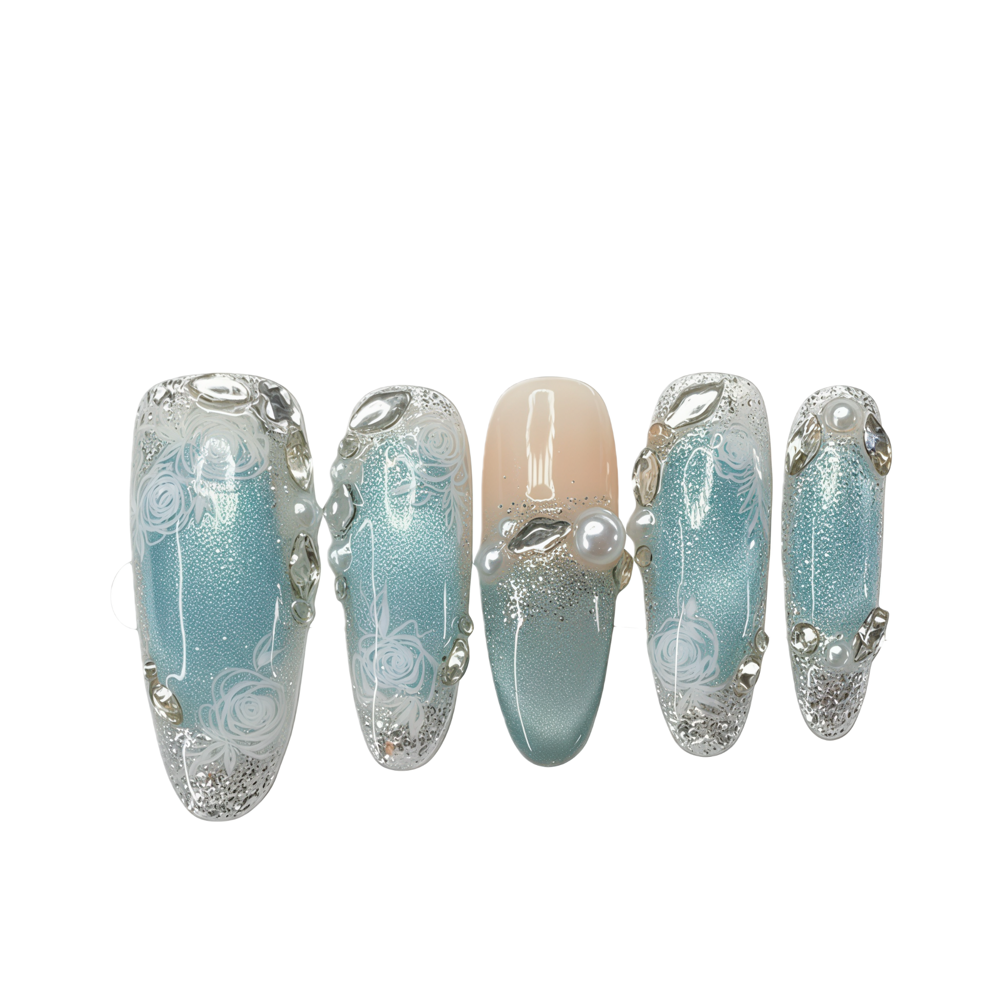 Set of decorative nails with light blue and silver design on a white background