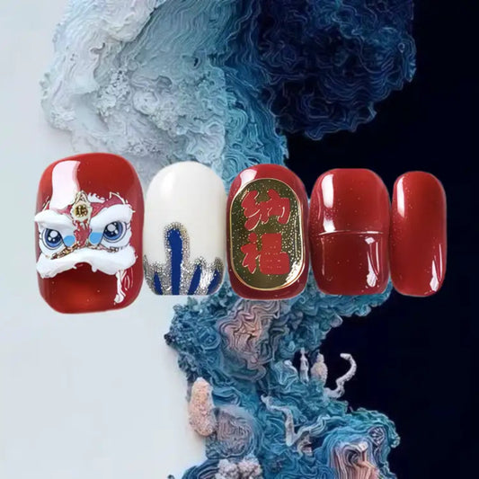 Nail art with traditional Chinese design on a textured blue and white background