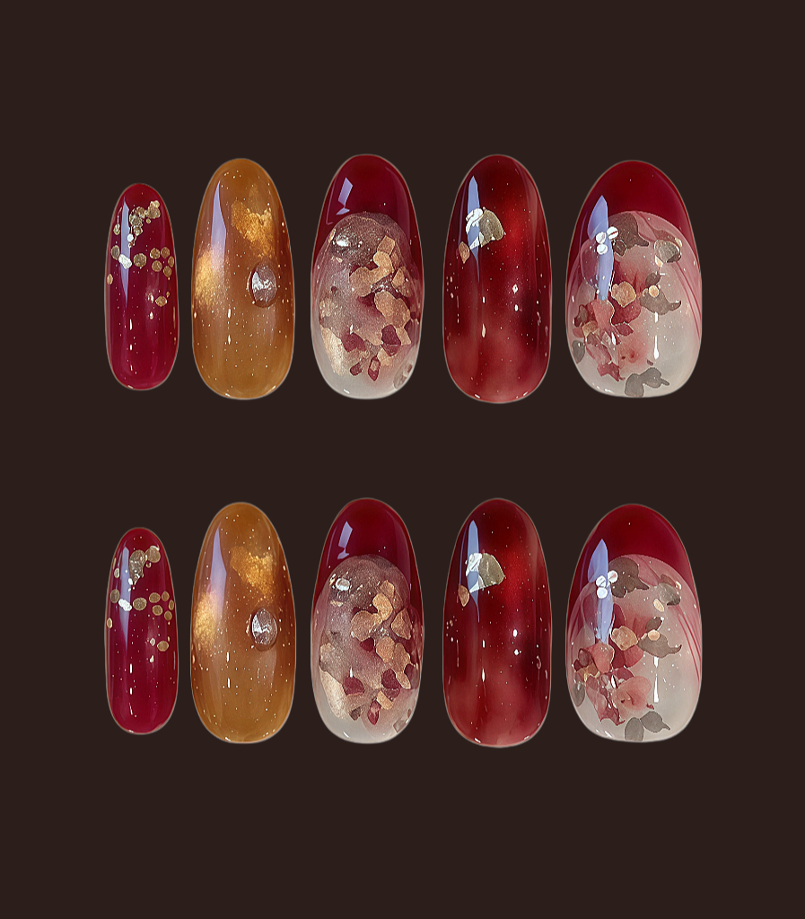 Set of red and gold nail designs with floral embellishments on a dark background