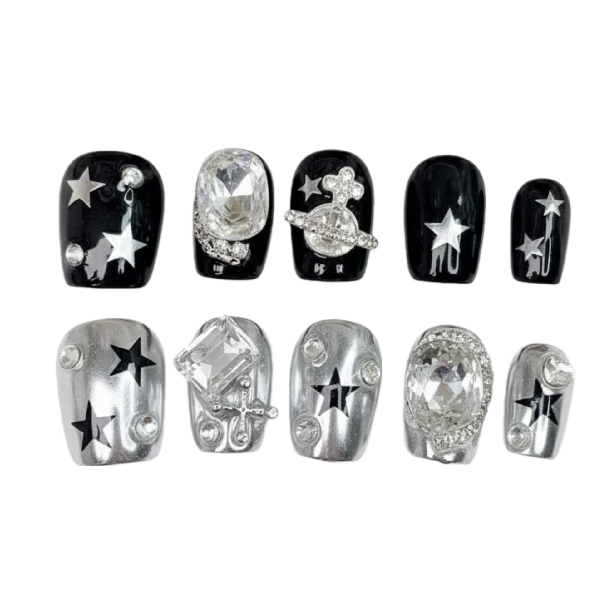 Decorative nail art stickers with stars and crystals on a white background