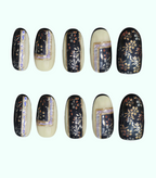 Set of nails with floral and geometric designs on a white background